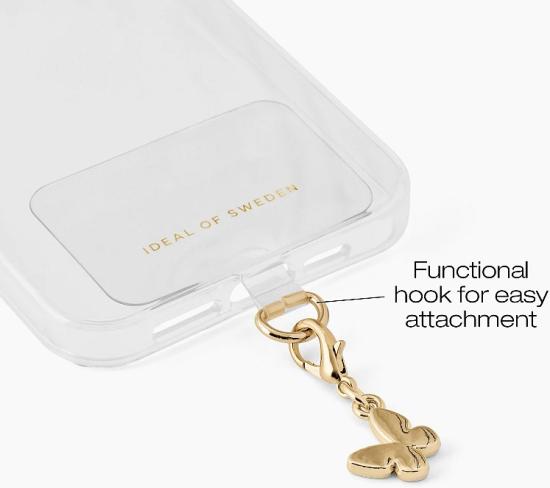 Klare Handyhülle von IDEAL OF SWEDEN mit einem goldenen Haken und Anhänger für einfache Befestigung